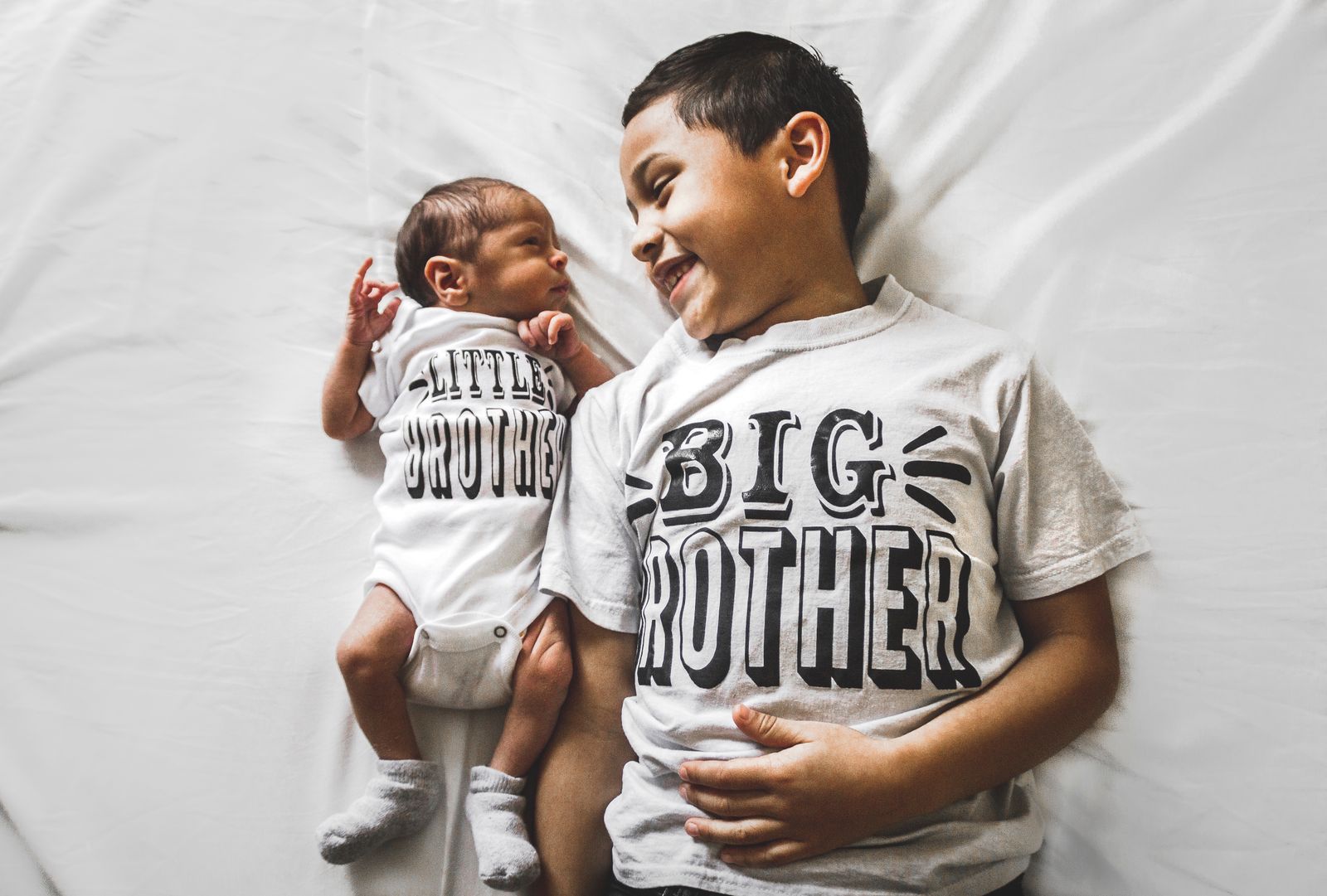 A big brother and his newborn sibling